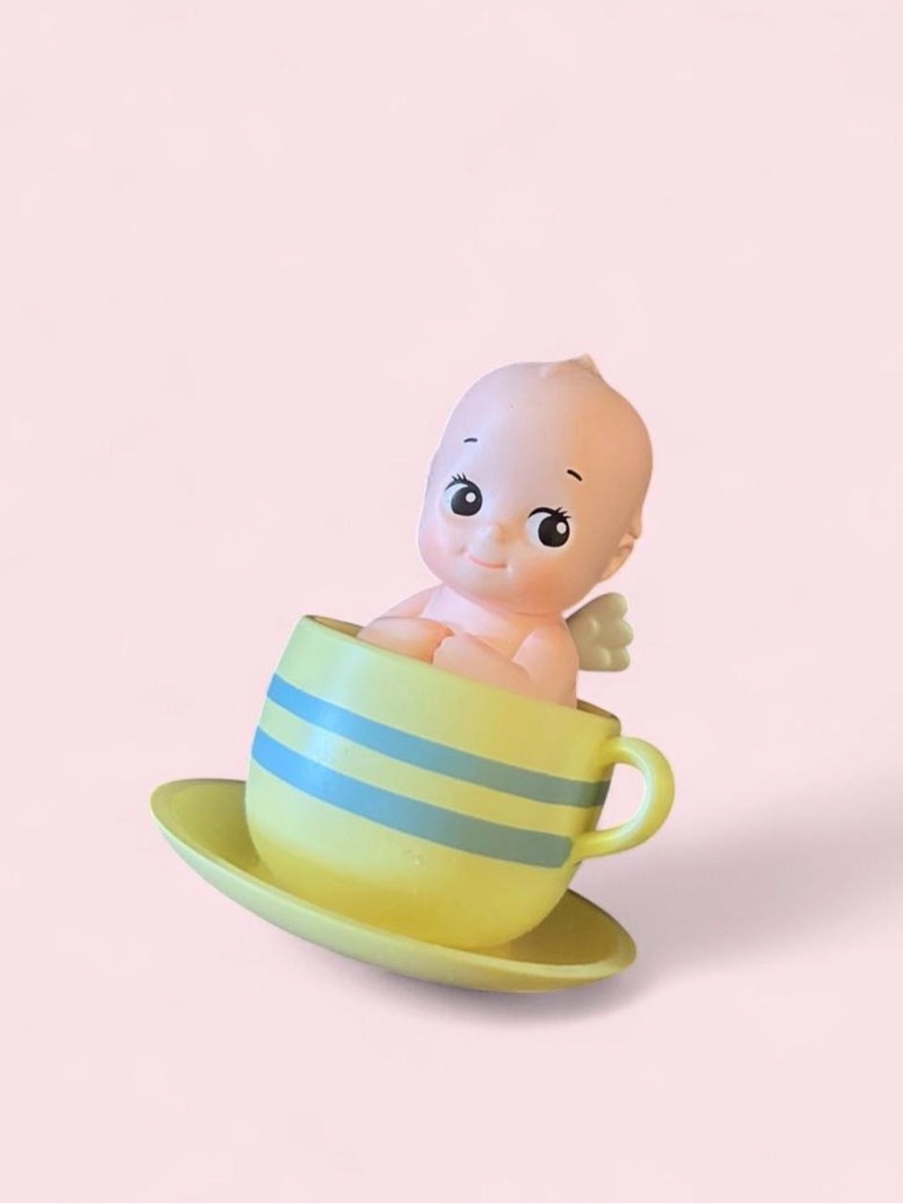 Kewpie doll in teacup 💛☕️
